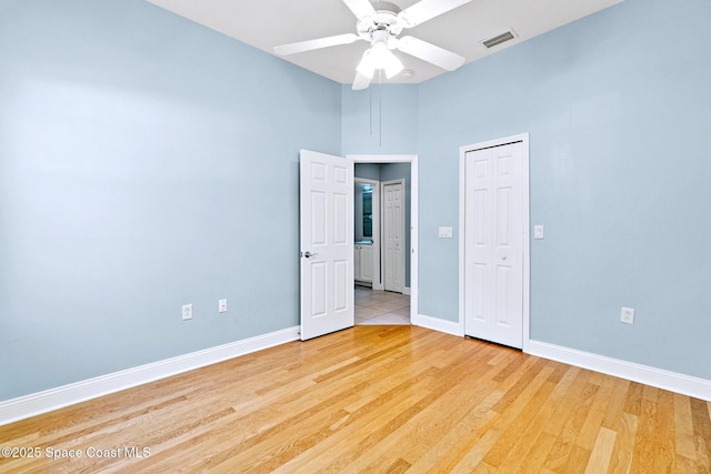 8657 Villanova Dr Unit 901, Cape Canaveral, FL 32920 - unfurnished room featuring light wood-type flooring, ceiling fan, baseboards, and visible vents