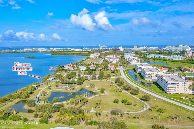 8657 Villanova Dr Unit 901, Cape Canaveral, FL 32920 - drone / aerial view with a water view and a view of city