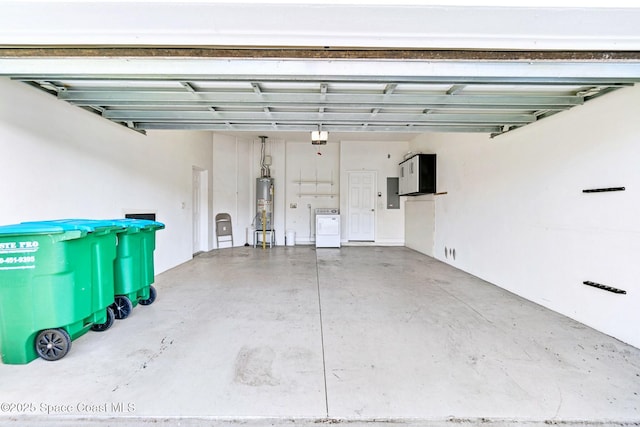 8657 Villanova Dr Unit 901, Cape Canaveral, FL 32920 - garage with a garage door opener, electric panel, and water heater