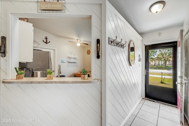 999 Jupiter Blvd NW, Palm Bay, FL 32907 - interior space with light tile patterned floors and ceiling fan