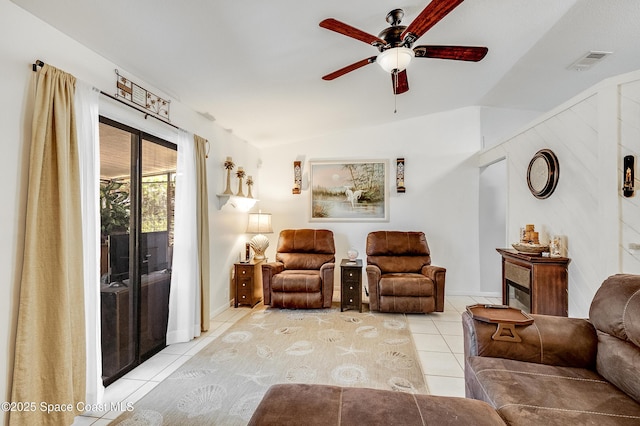 999 Jupiter Blvd NW, Palm Bay, FL 32907 - living area with visible vents, light tile patterned floors, ceiling fan, and lofted ceiling