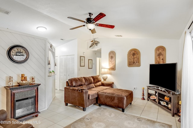999 Jupiter Blvd NW, Palm Bay, FL 32907 - living area with visible vents, ceiling fan, light tile patterned flooring, and lofted ceiling