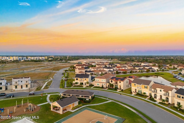 aerial view at dusk with a residential view
