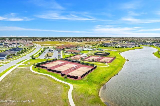 aerial view with a water view and a residential view