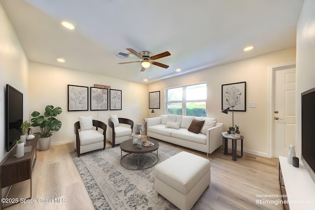 living room with ceiling fan, visible vents, baseboards, recessed lighting, and light wood-style flooring