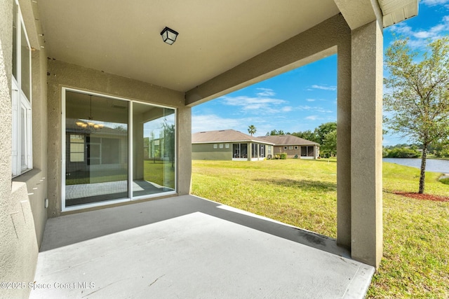 view of patio / terrace with a water view