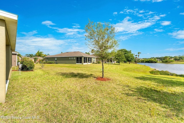 view of yard featuring a water view