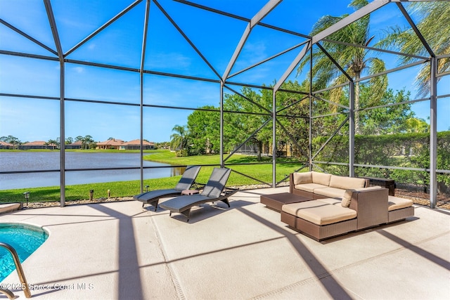 view of patio / terrace with a water view, an outdoor living space, and glass enclosure
