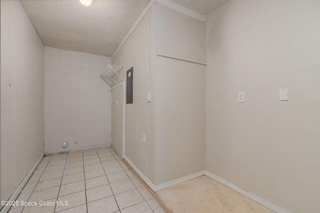257 Dorado Ave NE, Palm Bay, FL 32907 - clothes washing area featuring electric panel and a textured ceiling