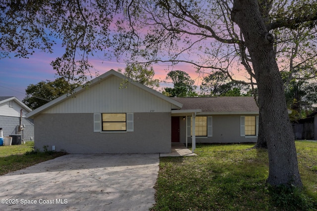 257 Dorado Ave NE, Palm Bay, FL 32907 - ranch-style home featuring a yard