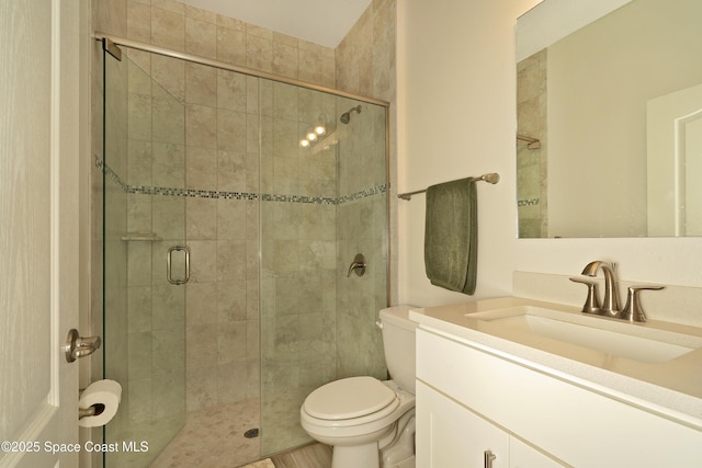 4710 Hebron Dr, Merritt Island, FL 32953 - bathroom with toilet, vanity, and a stall shower