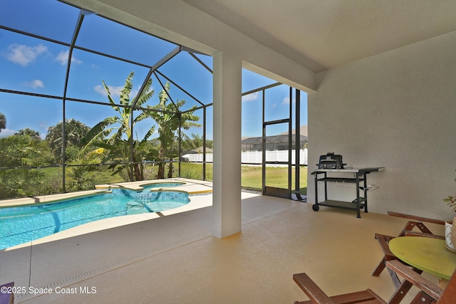4710 Hebron Dr, Merritt Island, FL 32953 - view of swimming pool featuring a pool with connected hot tub, glass enclosure, and a patio