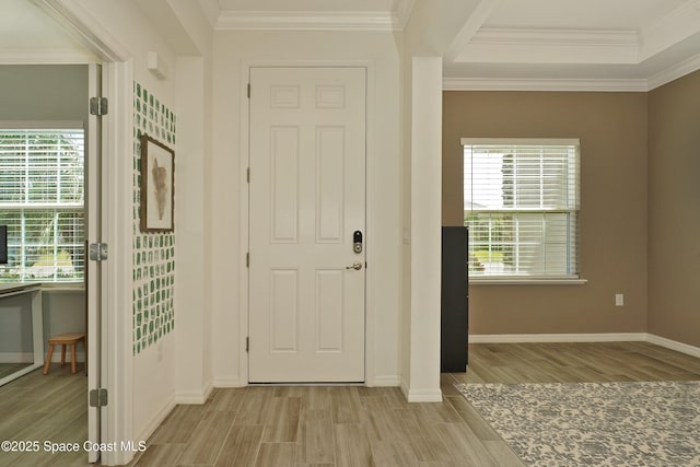 4710 Hebron Dr, Merritt Island, FL 32953 - foyer with light wood-style floors, baseboards, and ornamental molding