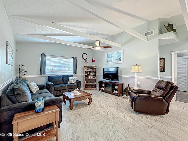 125 Terry St, Indian Harbour Beach, FL 32937 - living room featuring lofted ceiling with beams, visible vents, marble finish floor, and ceiling fan