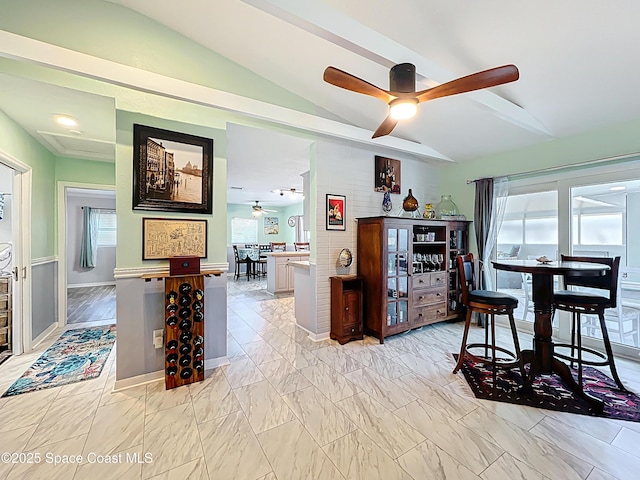 125 Terry St, Indian Harbour Beach, FL 32937 - dining room with marble finish floor, vaulted ceiling, and a ceiling fan