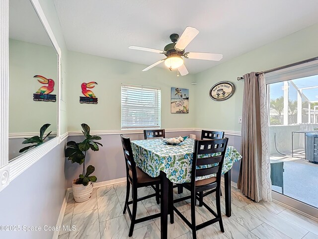 125 Terry St, Indian Harbour Beach, FL 32937 - dining area with marble finish floor, a wealth of natural light, and ceiling fan