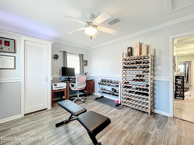 125 Terry St, Indian Harbour Beach, FL 32937 - office area featuring wood tiled floor, baseboards, ornamental molding, and visible vents