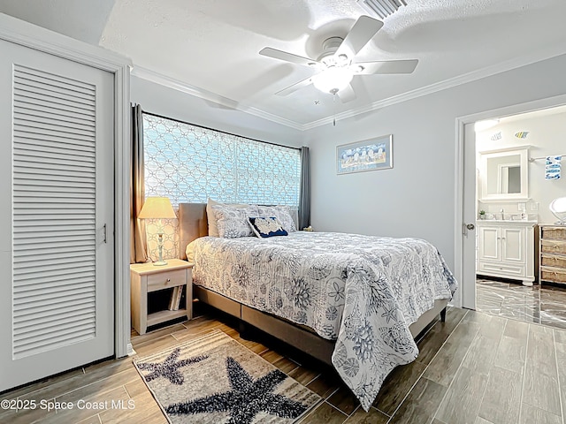 125 Terry St, Indian Harbour Beach, FL 32937 - bedroom featuring a ceiling fan, wood finished floors, and crown molding