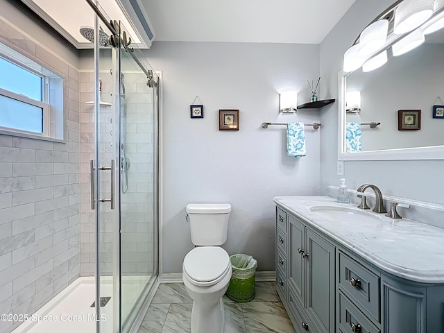 125 Terry St, Indian Harbour Beach, FL 32937 - full bathroom with marble finish floor, toilet, vanity, baseboards, and a stall shower