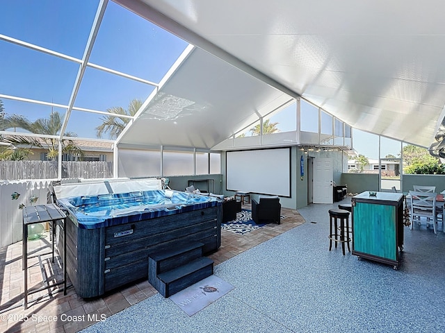 125 Terry St, Indian Harbour Beach, FL 32937 - view of patio featuring fence, outdoor dry bar, and a hot tub