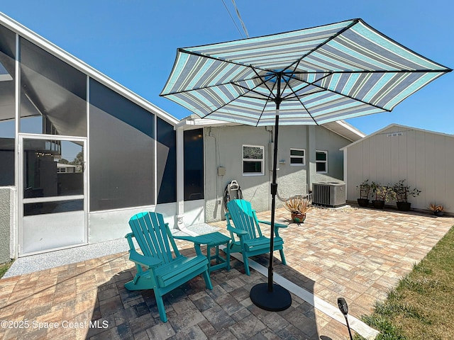125 Terry St, Indian Harbour Beach, FL 32937 - view of patio featuring central AC