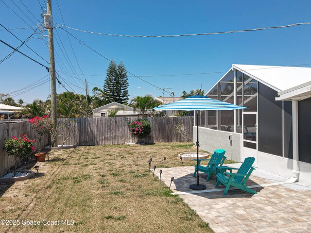 125 Terry St, Indian Harbour Beach, FL 32937 - view of yard featuring a fenced backyard and a patio area