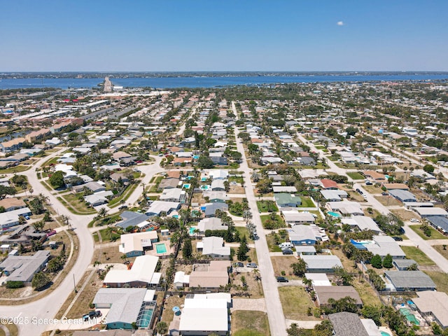 125 Terry St, Indian Harbour Beach, FL 32937 - birds eye view of property featuring a water view and a residential view