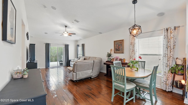 1546 Litchfield Dr, Melbourne, FL 32904 - dining space with visible vents, baseboards, a ceiling fan, and dark wood finished floors