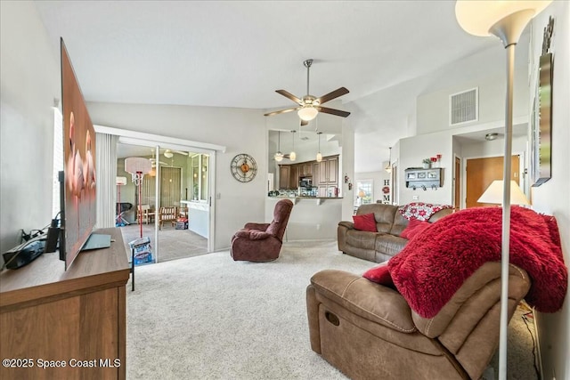 carpeted living room with visible vents, a ceiling fan, and lofted ceiling
