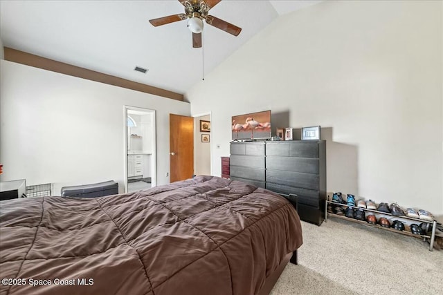 carpeted bedroom with high vaulted ceiling, ceiling fan, visible vents, and connected bathroom