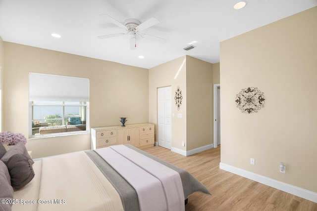 bedroom with ceiling fan, light wood-type flooring, visible vents, recessed lighting, and baseboards