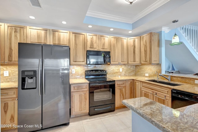 2470 Harbour Cove Dr, Hutchinson Island, FL 34949 - kitchen featuring a tray ceiling, visible vents, black appliances, a sink, and light brown cabinets