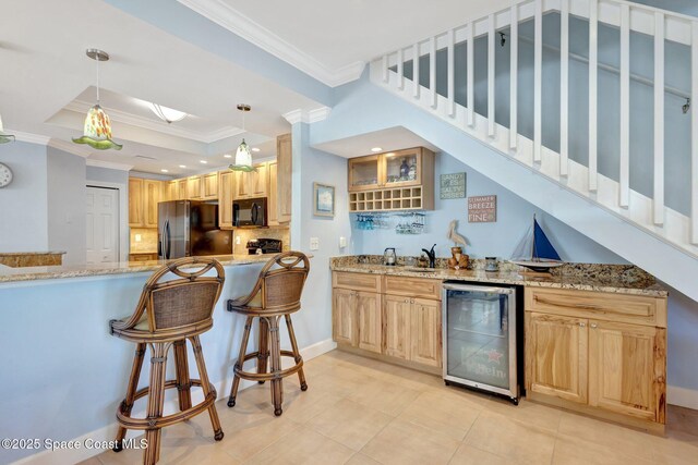 2470 Harbour Cove Dr, Hutchinson Island, FL 34949 - bar featuring indoor wet bar, black microwave, stainless steel refrigerator with ice dispenser, stairs, and wine cooler
