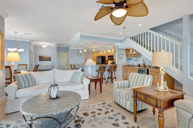 2470 Harbour Cove Dr, Hutchinson Island, FL 34949 - living area featuring crown molding, ceiling fan with notable chandelier, light tile patterned flooring, and stairs