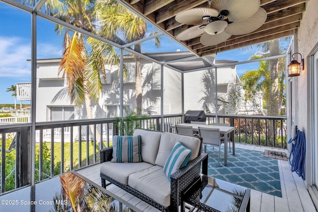 2470 Harbour Cove Dr, Hutchinson Island, FL 34949 - sunroom featuring ceiling fan