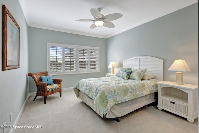2470 Harbour Cove Dr, Hutchinson Island, FL 34949 - bedroom featuring crown molding, baseboards, a ceiling fan, and light carpet