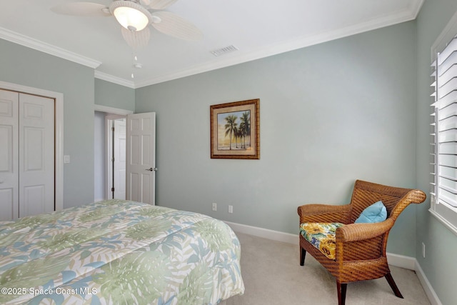 2470 Harbour Cove Dr, Hutchinson Island, FL 34949 - bedroom featuring visible vents, baseboards, a closet, crown molding, and light carpet