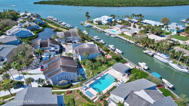 2470 Harbour Cove Dr, Hutchinson Island, FL 34949 - drone / aerial view featuring a residential view and a water view