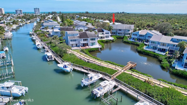 2470 Harbour Cove Dr, Hutchinson Island, FL 34949 - drone / aerial view featuring a water view