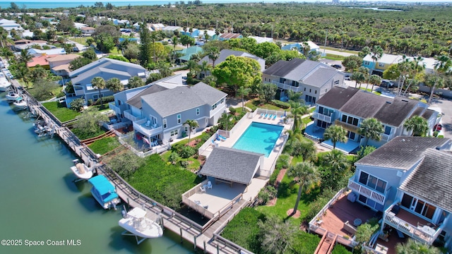 2470 Harbour Cove Dr, Hutchinson Island, FL 34949 - bird's eye view with a residential view and a water view