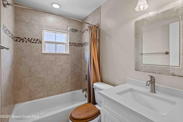 bathroom with toilet, shower / bath combo, and vanity