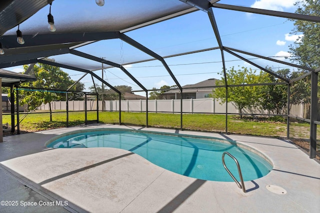 view of swimming pool with a patio area, a lawn, a fenced backyard, a fenced in pool, and a lanai