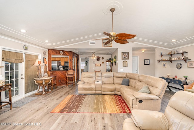 living area with crown molding, ceiling fan, recessed lighting, wood finished floors, and visible vents