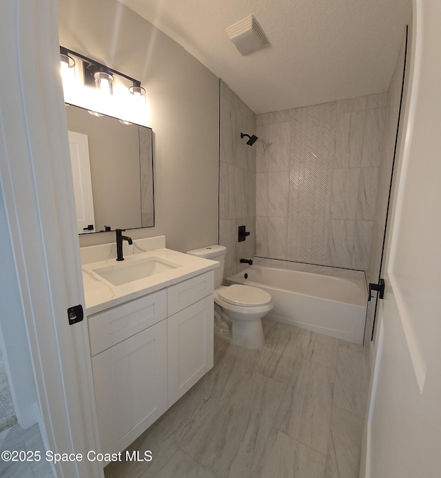 full bath with visible vents, toilet, tub / shower combination, vanity, and marble finish floor