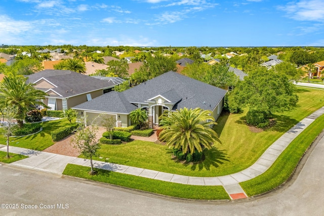 drone / aerial view featuring a residential view
