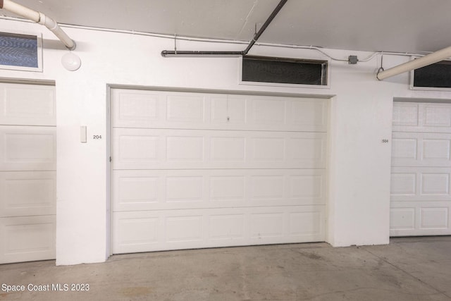 8941 Lake Dr Unit 204, Cape Canaveral, FL 32920 - view of garage