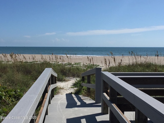 8941 Lake Dr Unit 204, Cape Canaveral, FL 32920 - property view of water with a beach view