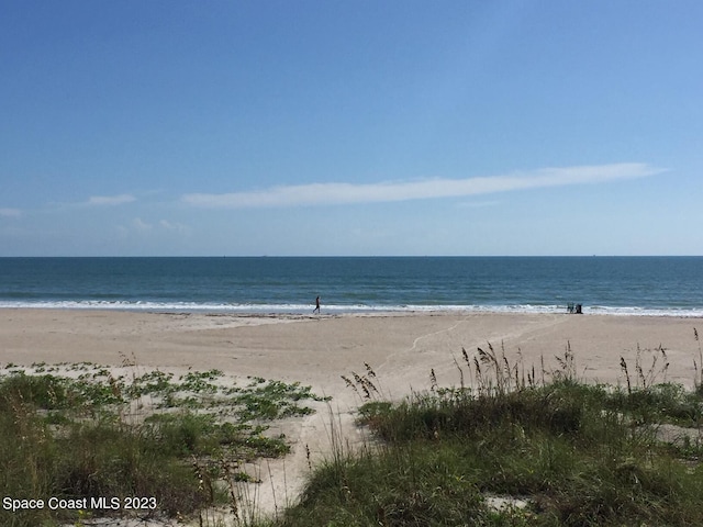 8941 Lake Dr Unit 204, Cape Canaveral, FL 32920 - property view of water featuring a beach view