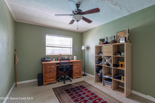 office area featuring baseboards, a textured ceiling, and a ceiling fan