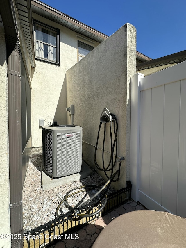 view of patio / terrace featuring cooling unit